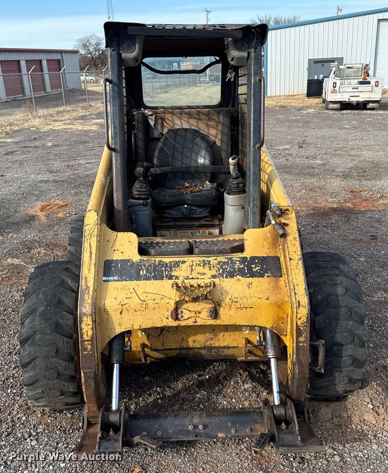 image for item ES5765 2002 Caterpillar 246 skid steer loader