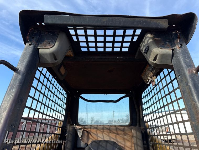 image for item ES5765 2002 Caterpillar 246 skid steer loader