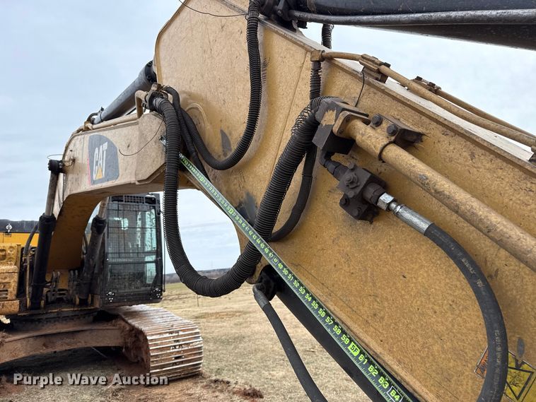 image for item ES5799 2015 Caterpillar 326FL excavator