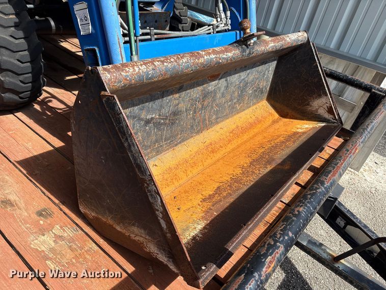 image for item EU7405 New Holland TC30 MFWD tractor