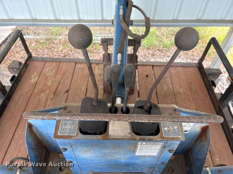 image for item EU7405 New Holland TC30 MFWD tractor