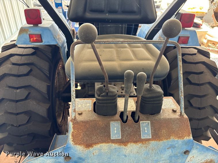 image for item EU7405 New Holland TC30 MFWD tractor