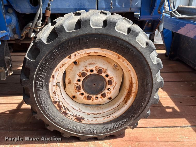 image for item EU7405 New Holland TC30 MFWD tractor