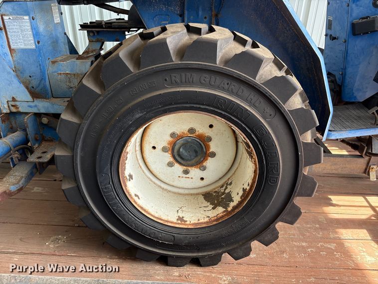 image for item EU7405 New Holland TC30 MFWD tractor