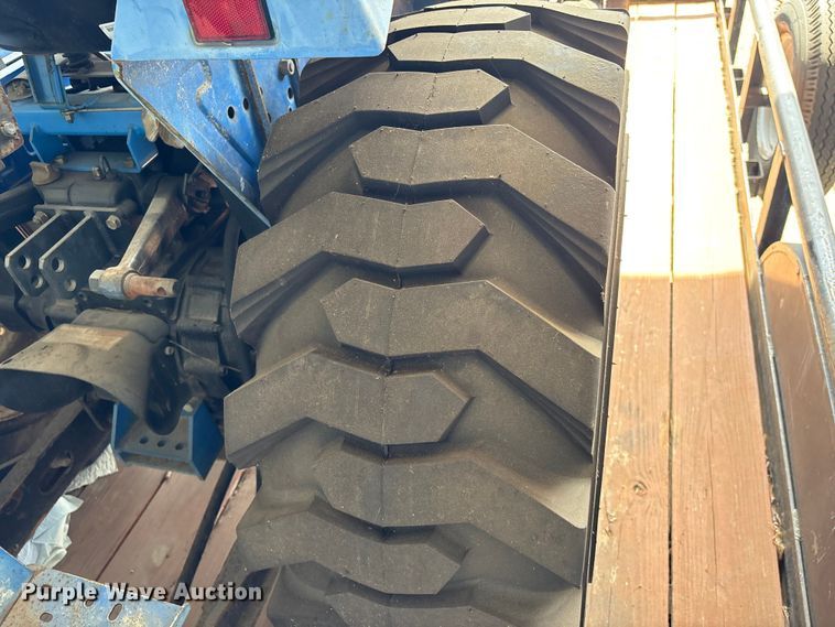 image for item EU7405 New Holland TC30 MFWD tractor