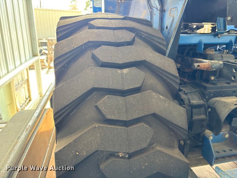 image for item EU7405 New Holland TC30 MFWD tractor