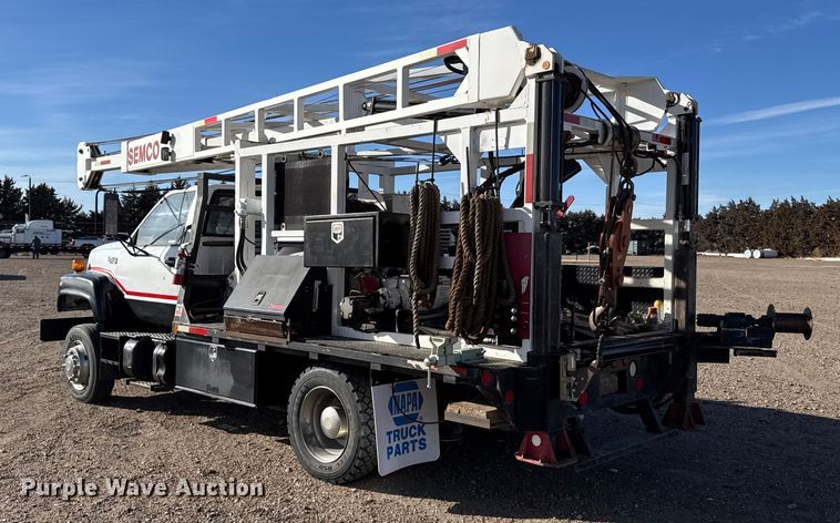 image for item FB0625 1991 Chevrolet C6500 pulling truck