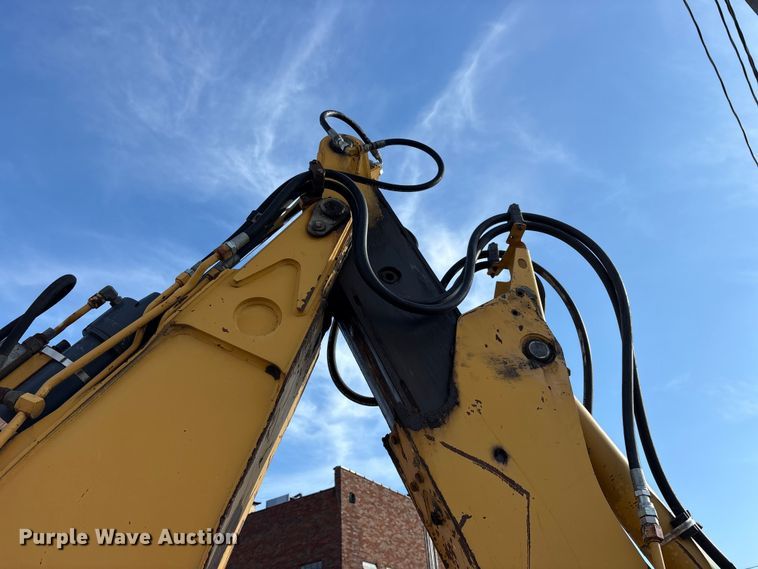 image for item FB8622 1999 John Deere 310SE backhoe