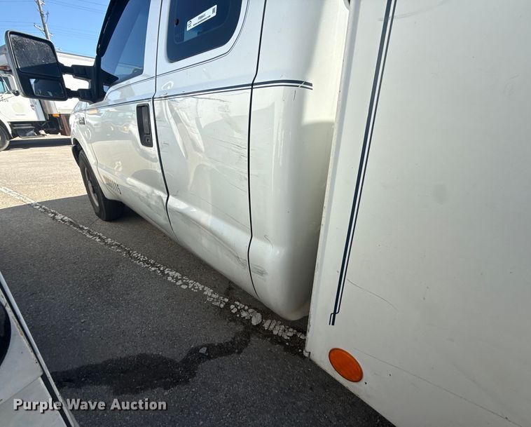 image for item FB8641 2001 Ford F250 Super Duty Ext. Cab utility bed pickup truck