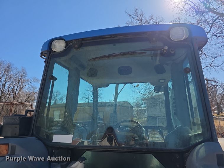 image for item FI0794 2000 New Holland TN75S MFWD tractor