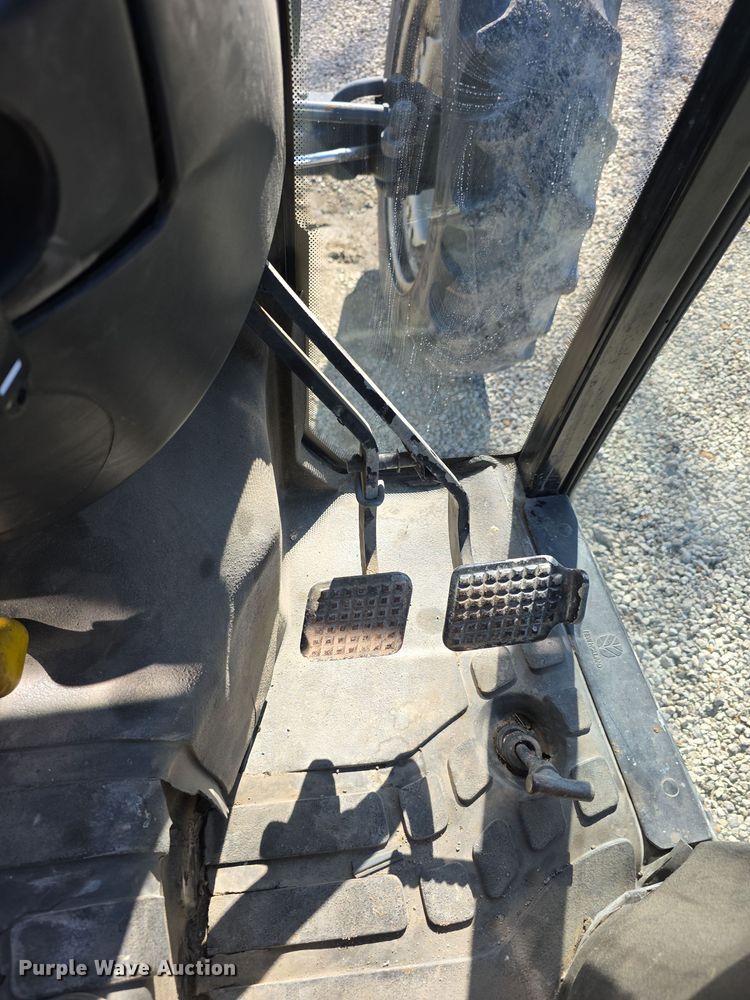 image for item FI0794 2000 New Holland TN75S MFWD tractor