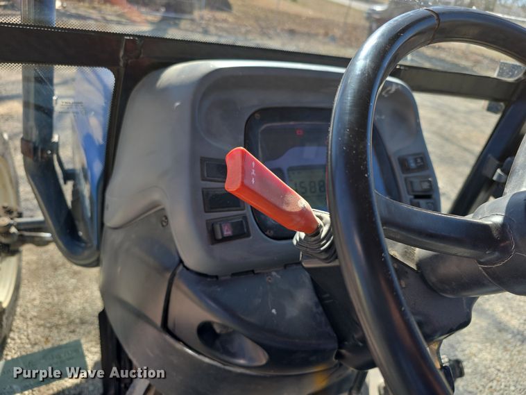 image for item FI0794 2000 New Holland TN75S MFWD tractor