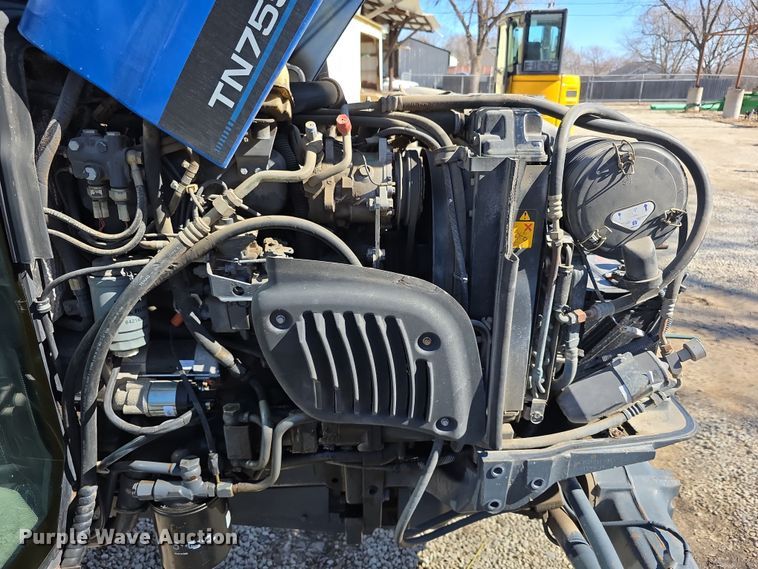 image for item FI0794 2000 New Holland TN75S MFWD tractor