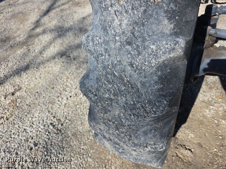 image for item FI0794 2000 New Holland TN75S MFWD tractor