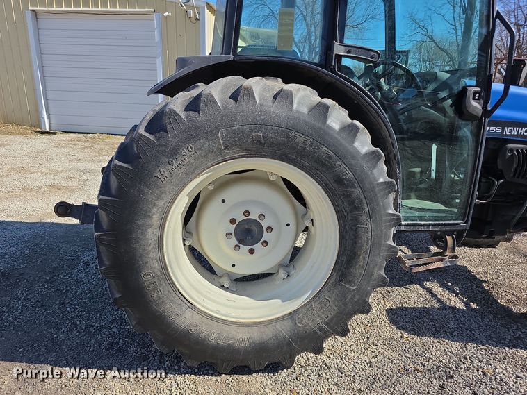 image for item FI0794 2000 New Holland TN75S MFWD tractor