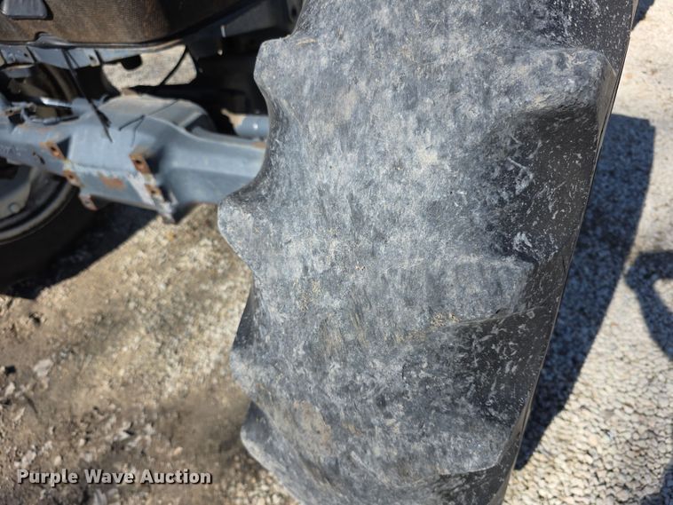 image for item FI0794 2000 New Holland TN75S MFWD tractor