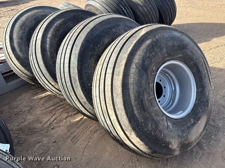 image for item DZ5045 (4) 21.5L-16.1SL tires and wheels