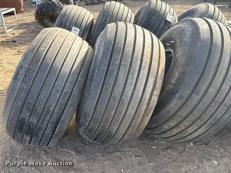 image for item DZ5045 (4) 21.5L-16.1SL tires and wheels