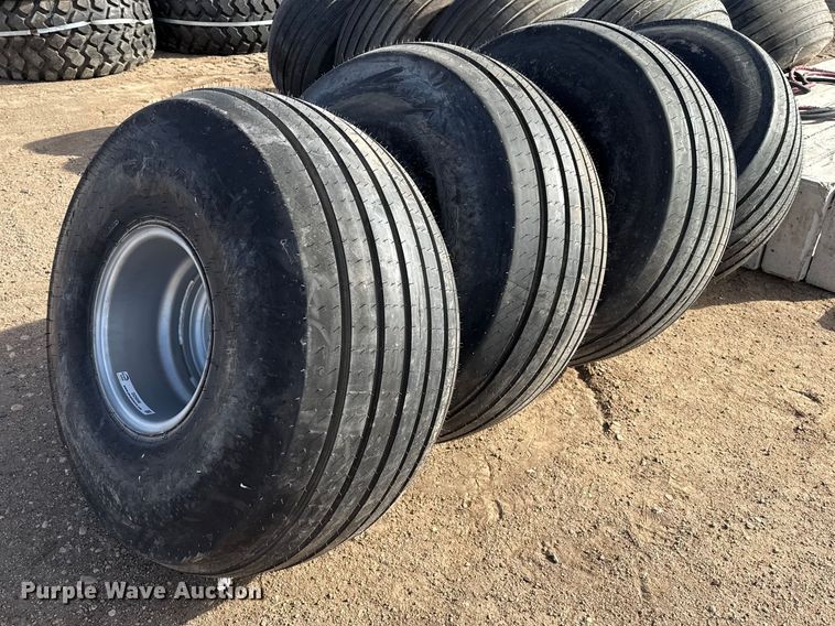 image for item DZ5046 (4) 21.5L-16.1SL tires and wheels