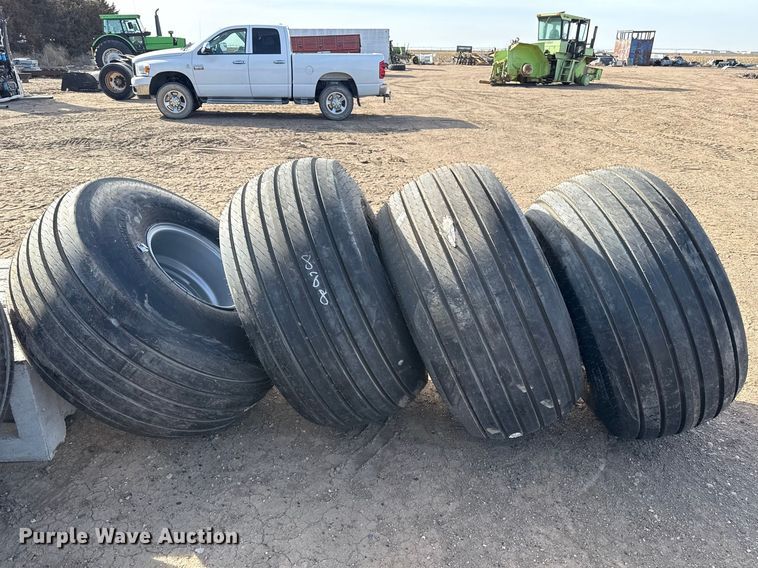 image for item DZ5046 (4) 21.5L-16.1SL tires and wheels