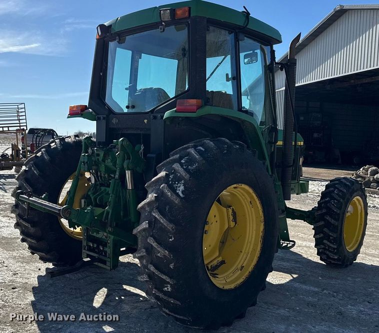 image for item EF2326 1999 John Deere 6410 MFWD tractor