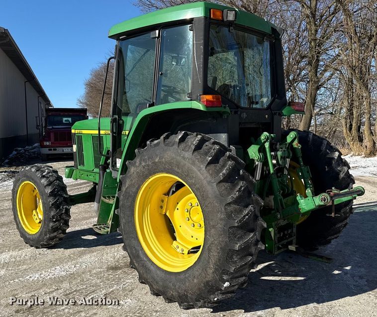 image for item EF2326 1999 John Deere 6410 MFWD tractor