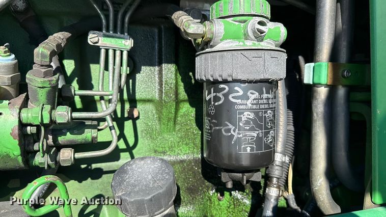 image for item EF2326 1999 John Deere 6410 MFWD tractor