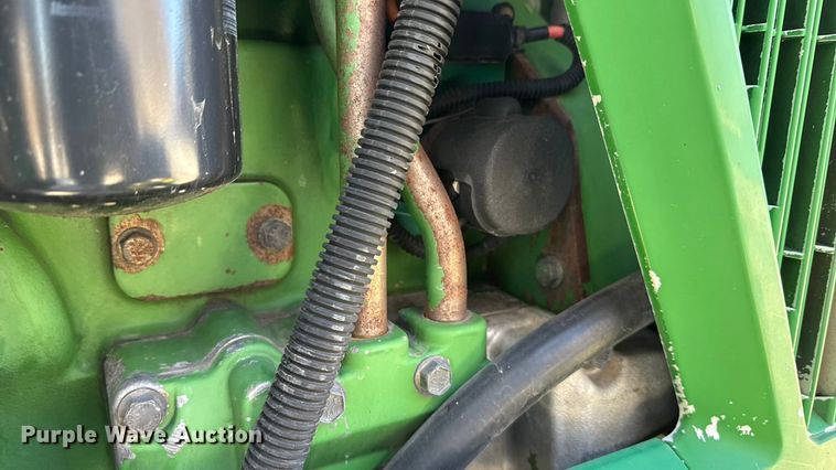 image for item EF2326 1999 John Deere 6410 MFWD tractor