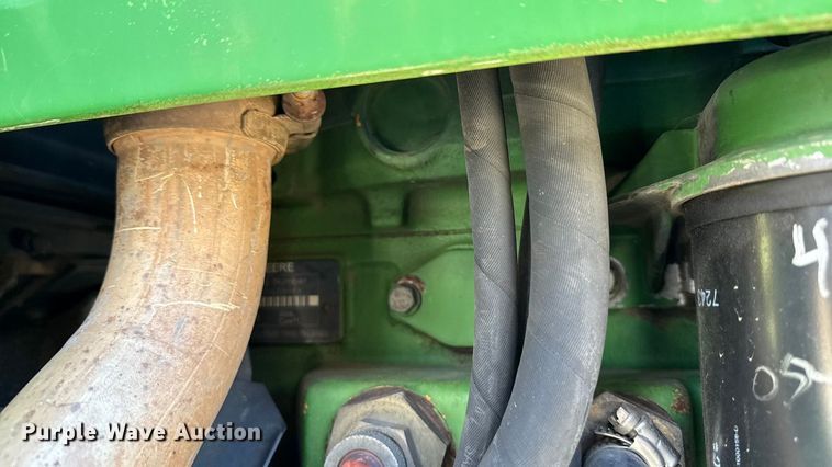 image for item EF2326 1999 John Deere 6410 MFWD tractor