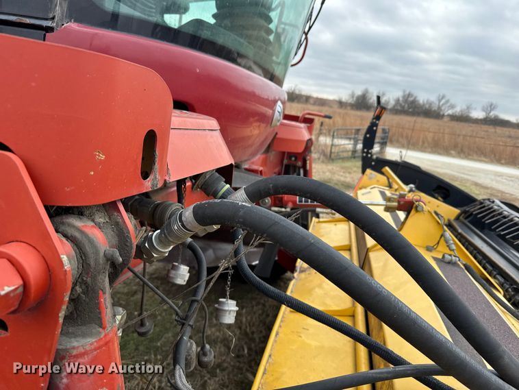 image for item FB0512 2007 New Holland HW325 swather / windrower