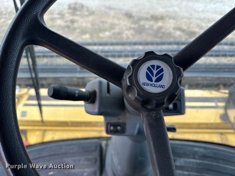 image for item FB0512 2007 New Holland HW325 swather / windrower