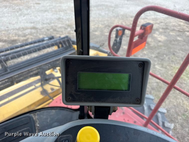image for item FB0512 2007 New Holland HW325 swather / windrower