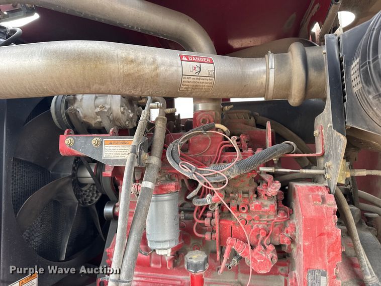 image for item FB0512 2007 New Holland HW325 swather / windrower