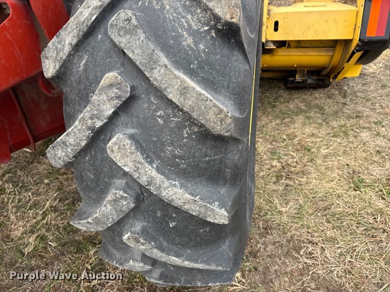 image for item FB0512 2007 New Holland HW325 swather / windrower