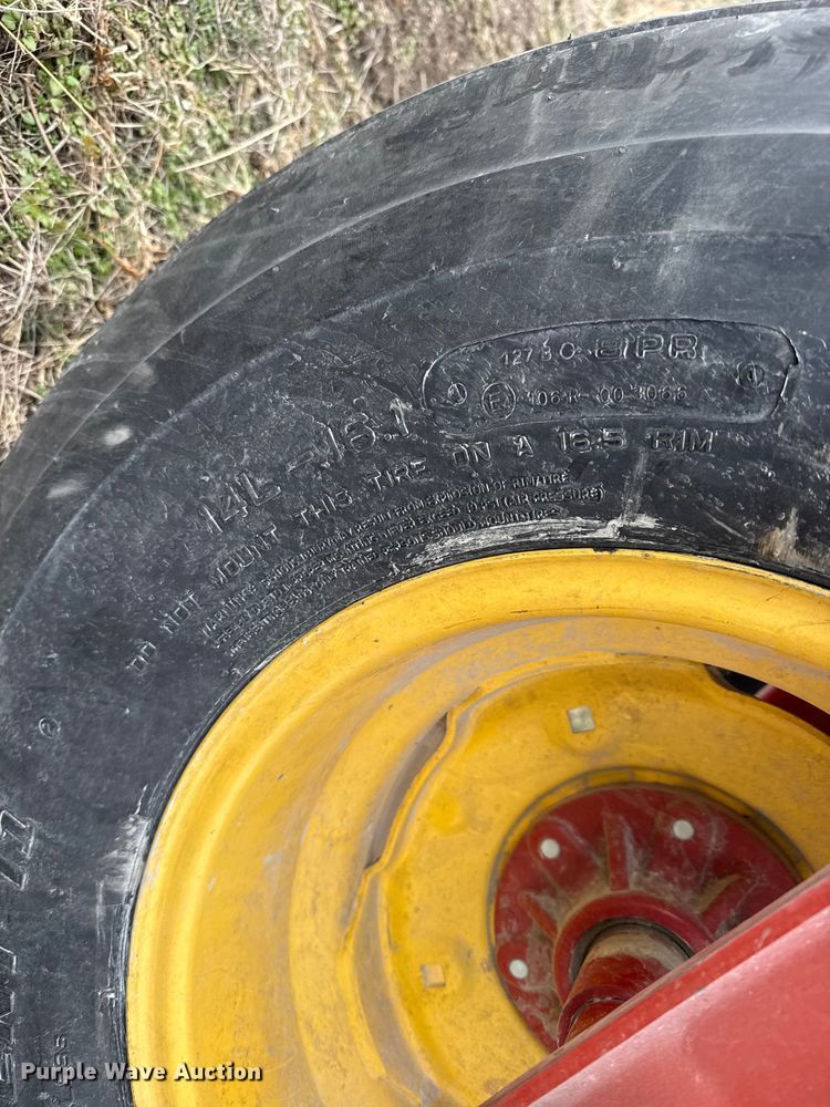 image for item FB0512 2007 New Holland HW325 swather / windrower