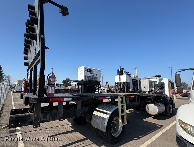 image for item EC8214 2013 Peterbilt 320 flatbed truck