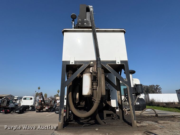 image for item EC8214 2013 Peterbilt 320 flatbed truck