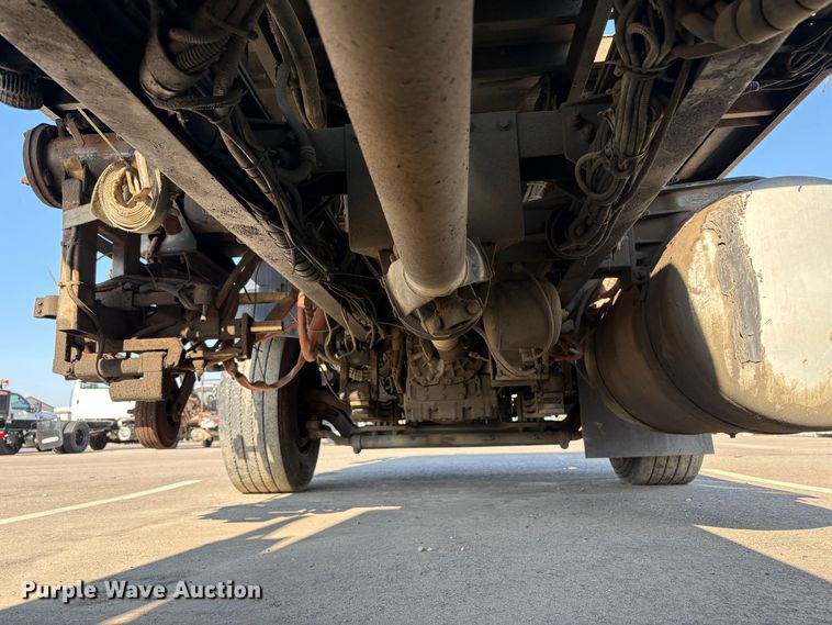 image for item EC8214 2013 Peterbilt 320 flatbed truck