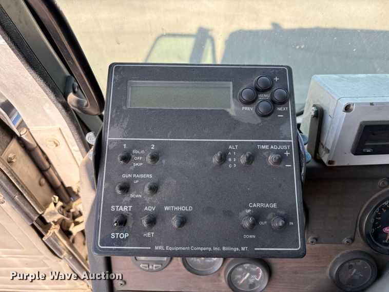 image for item EC8214 2013 Peterbilt 320 flatbed truck