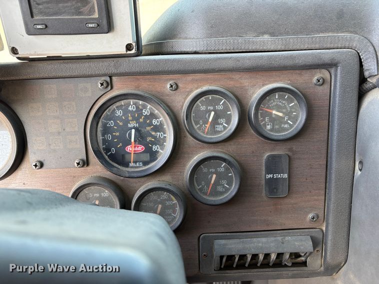 image for item EC8214 2013 Peterbilt 320 flatbed truck