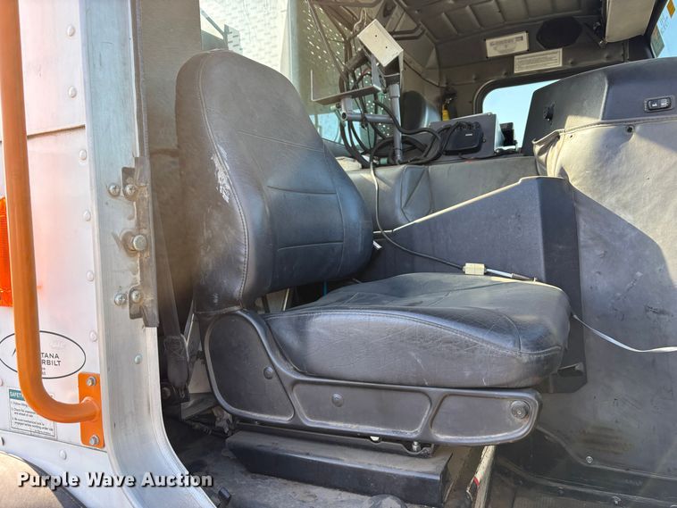 image for item EC8214 2013 Peterbilt 320 flatbed truck