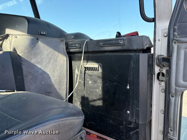 image for item EC8214 2013 Peterbilt 320 flatbed truck