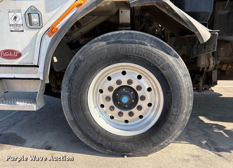 image for item EC8214 2013 Peterbilt 320 flatbed truck