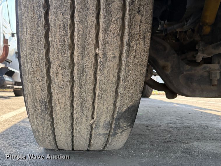 image for item EC8214 2013 Peterbilt 320 flatbed truck