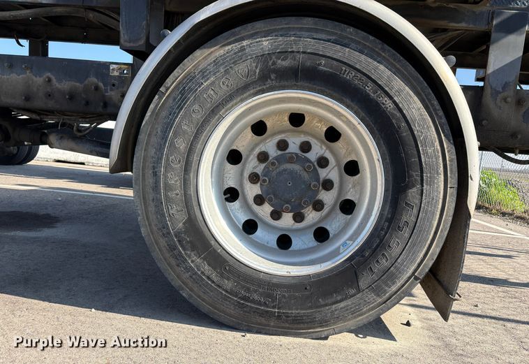 image for item EC8214 2013 Peterbilt 320 flatbed truck