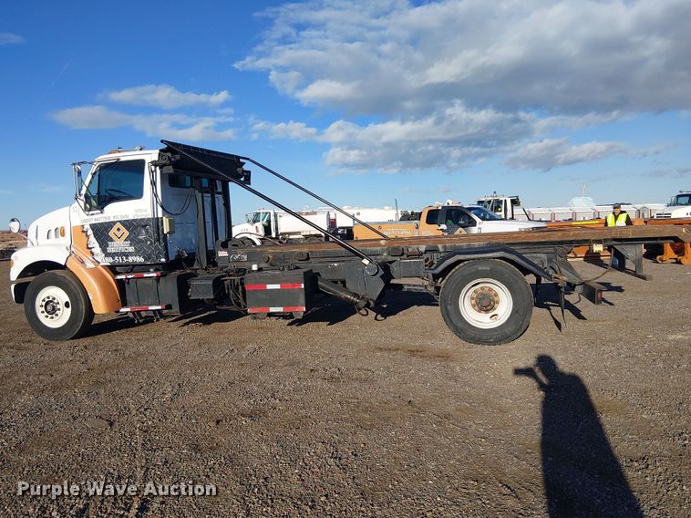image for item EE5178 2000 Sterling L7500 roll-off container truck