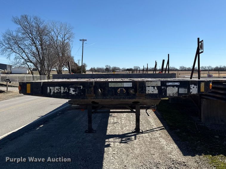 image for item EN0305 1999 Fontaine IPTW-6-8048WSAK flatbed trailer