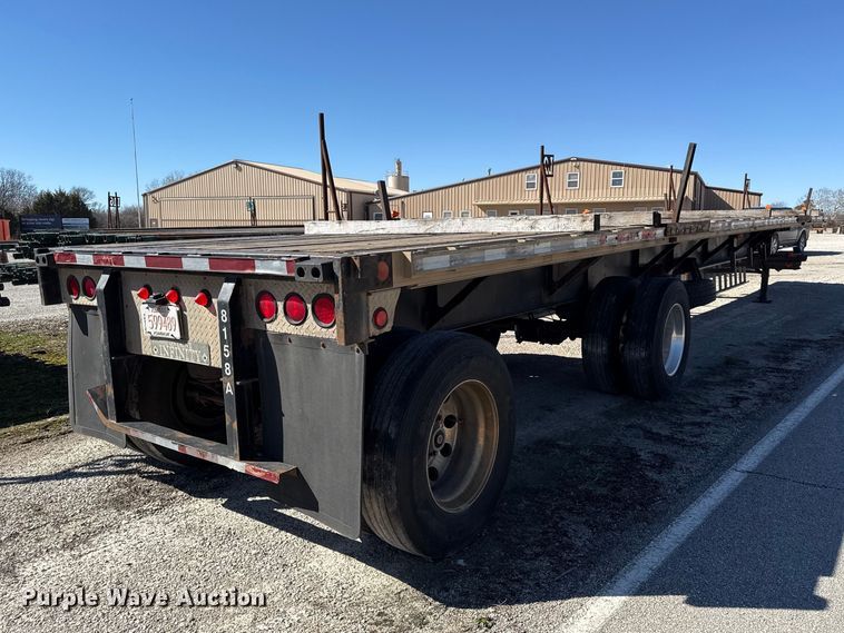 image for item EN0305 1999 Fontaine IPTW-6-8048WSAK flatbed trailer