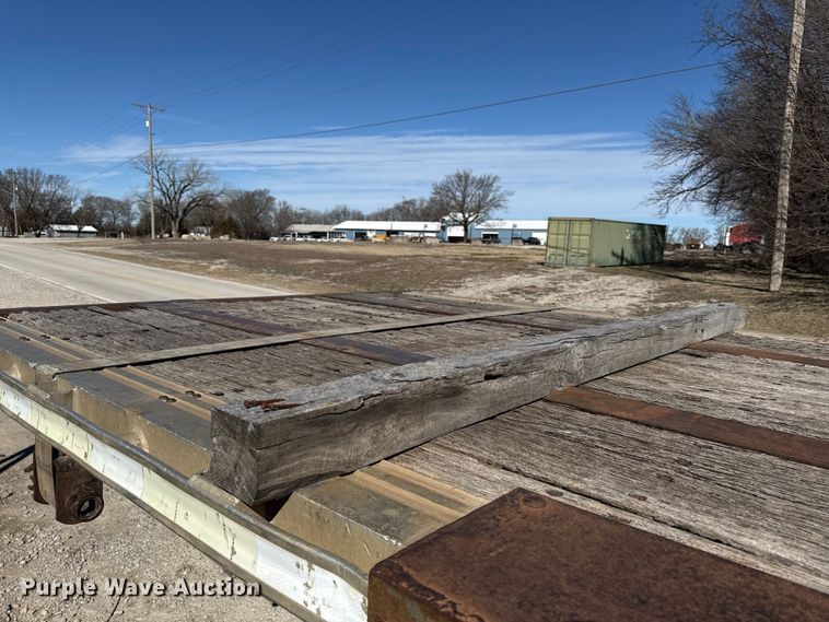 image for item EN0305 1999 Fontaine IPTW-6-8048WSAK flatbed trailer