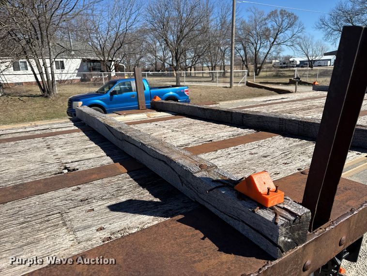 image for item EN0305 1999 Fontaine IPTW-6-8048WSAK flatbed trailer